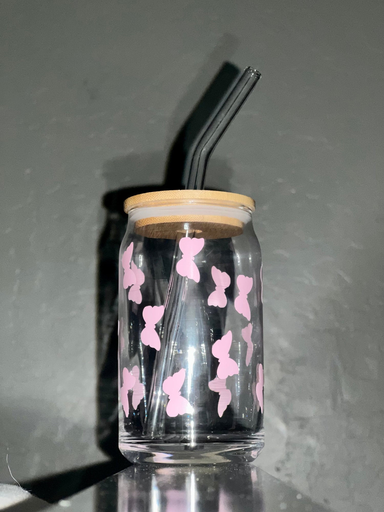 Multiple Butterfly 16oz Libby glass with bamboo top and glass straw